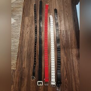 Stylish Black, Red, and White Belts Set